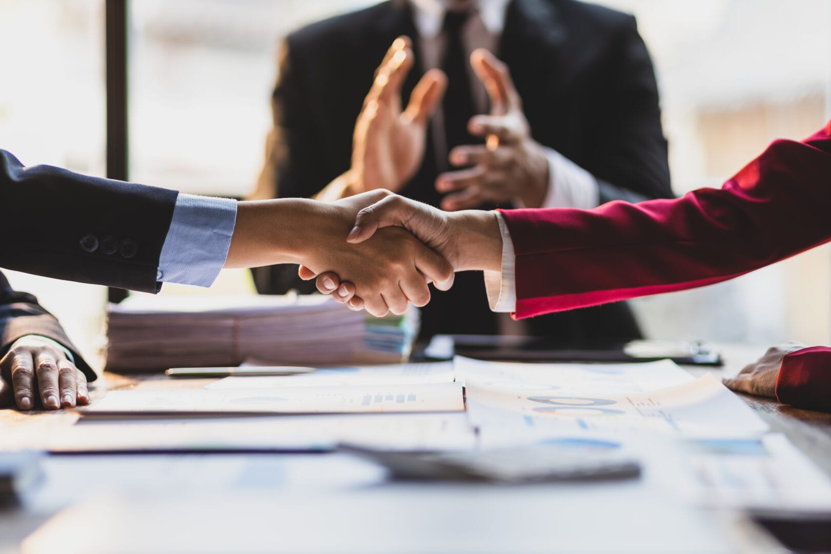 Handshake at a meeting of business people